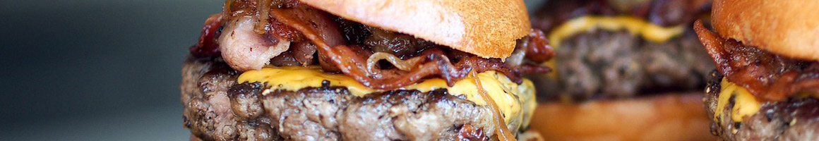Eating American (Traditional) Burger at Wayback Burgers restaurant in West Hartford, CT.